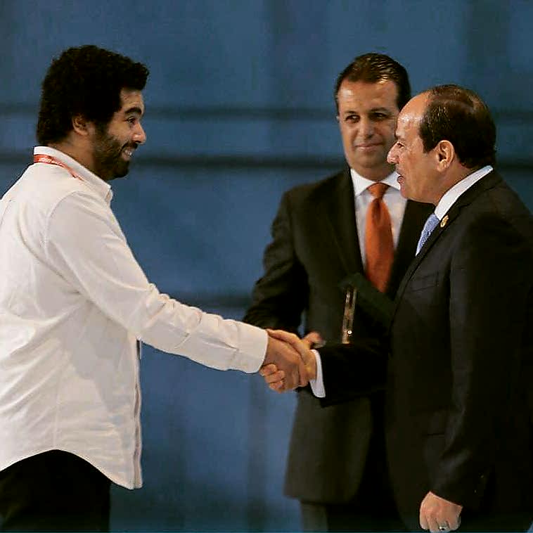 The founder of WiRE Microsystems, Mahmoud Saad, while receiving the award from Mr. President Abdel Fattah el-Sisi